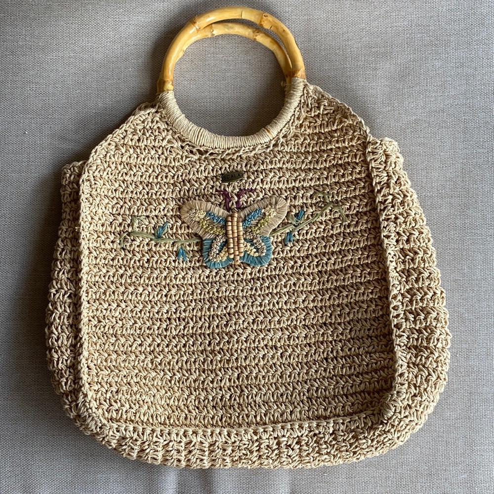 SCALA vintage straw weave purse. Measures approximately 9” x 9” Bottom/sides 3”